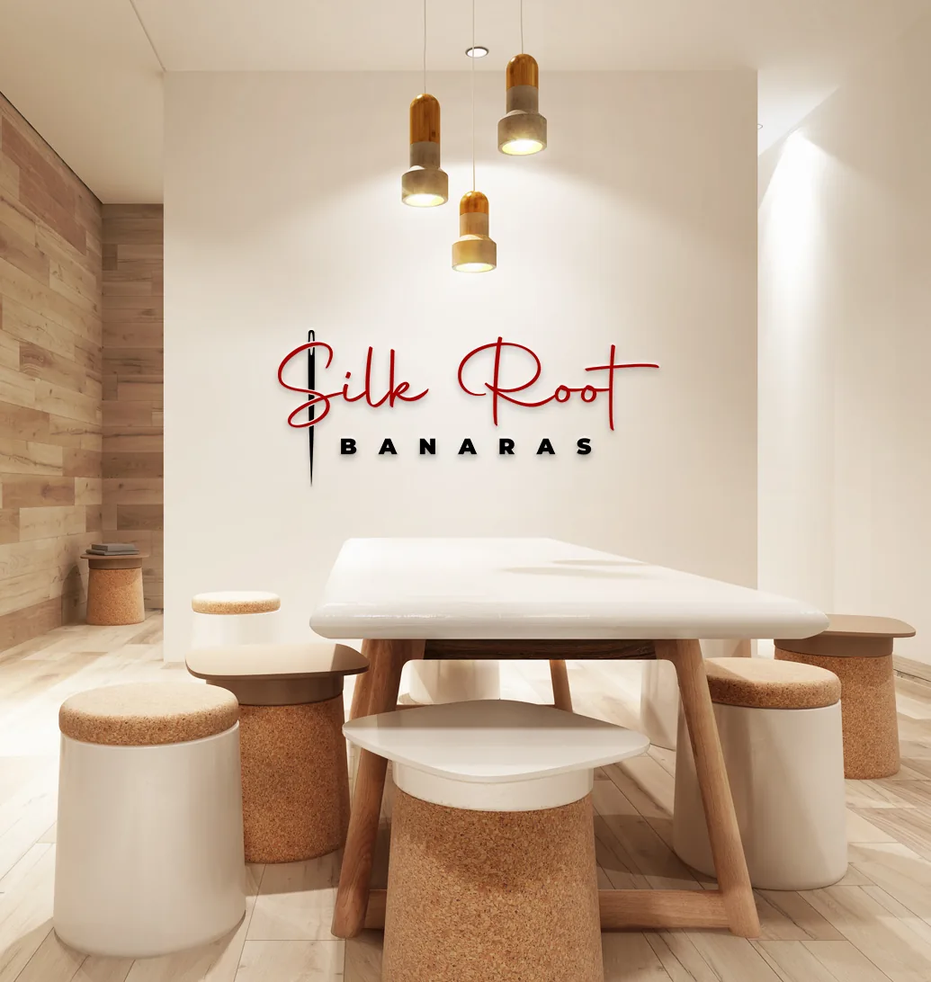 Silk Root Banaras logo on a studio wall